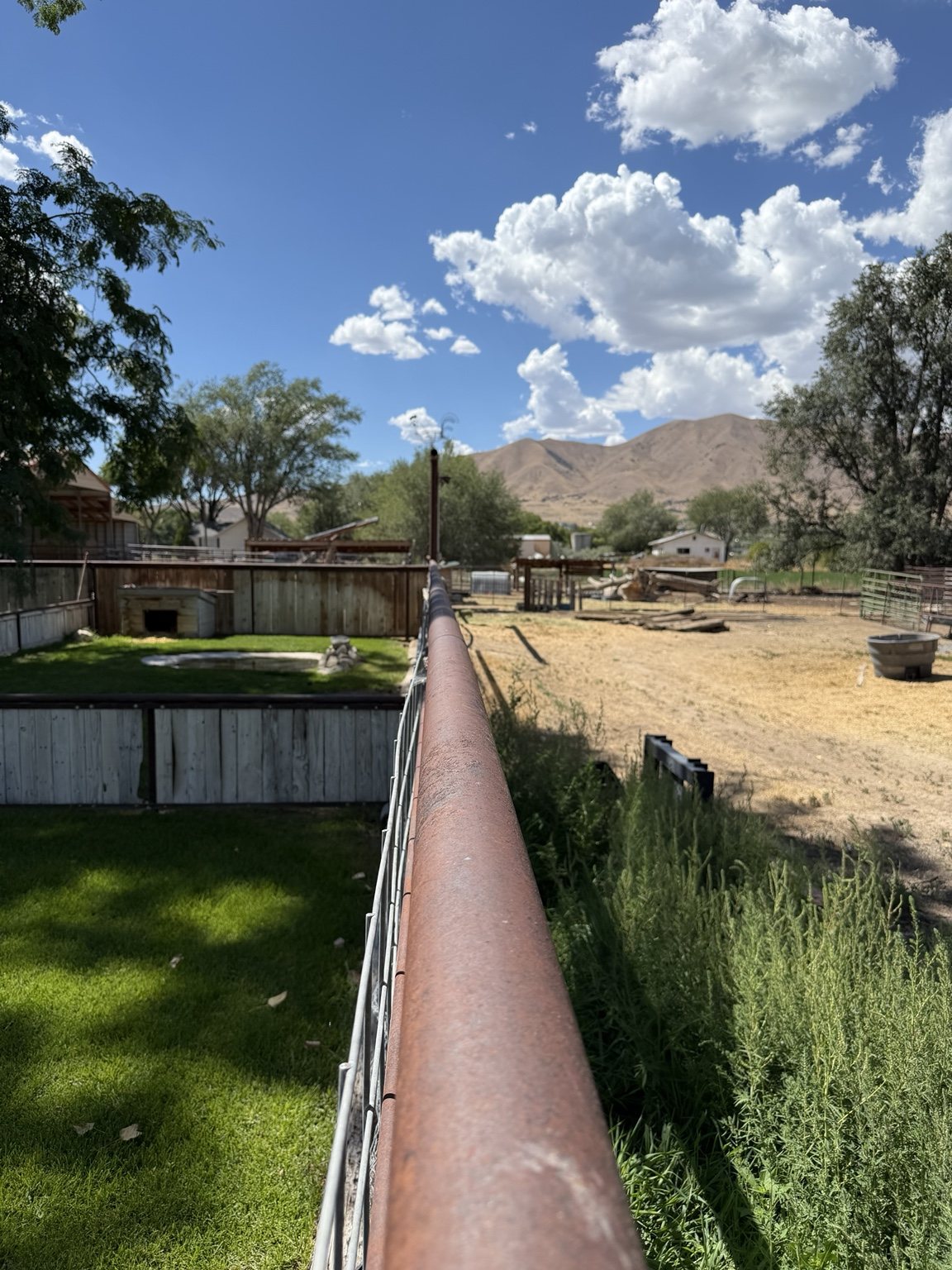 Drill pipe fence along a property boundary