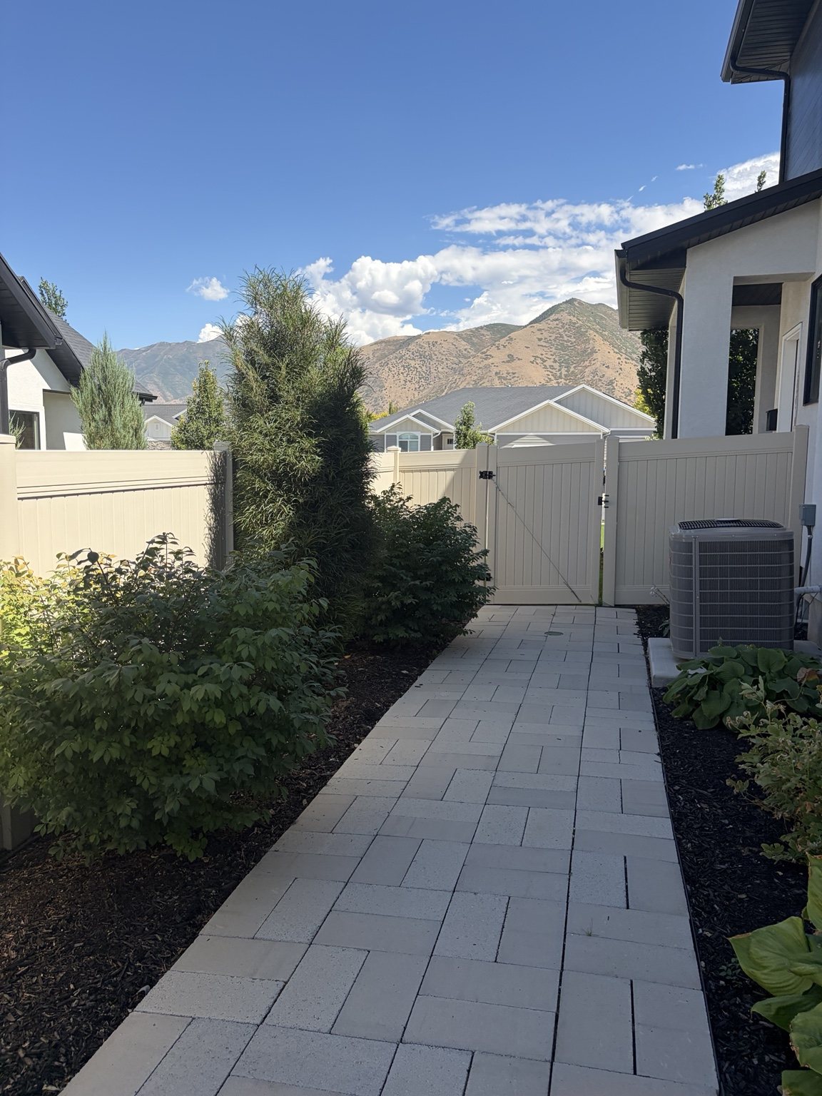 White vinyl fence with double gate